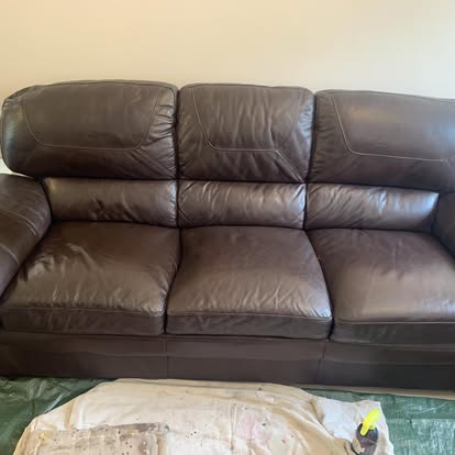 Brown leather sofa after colour restoration